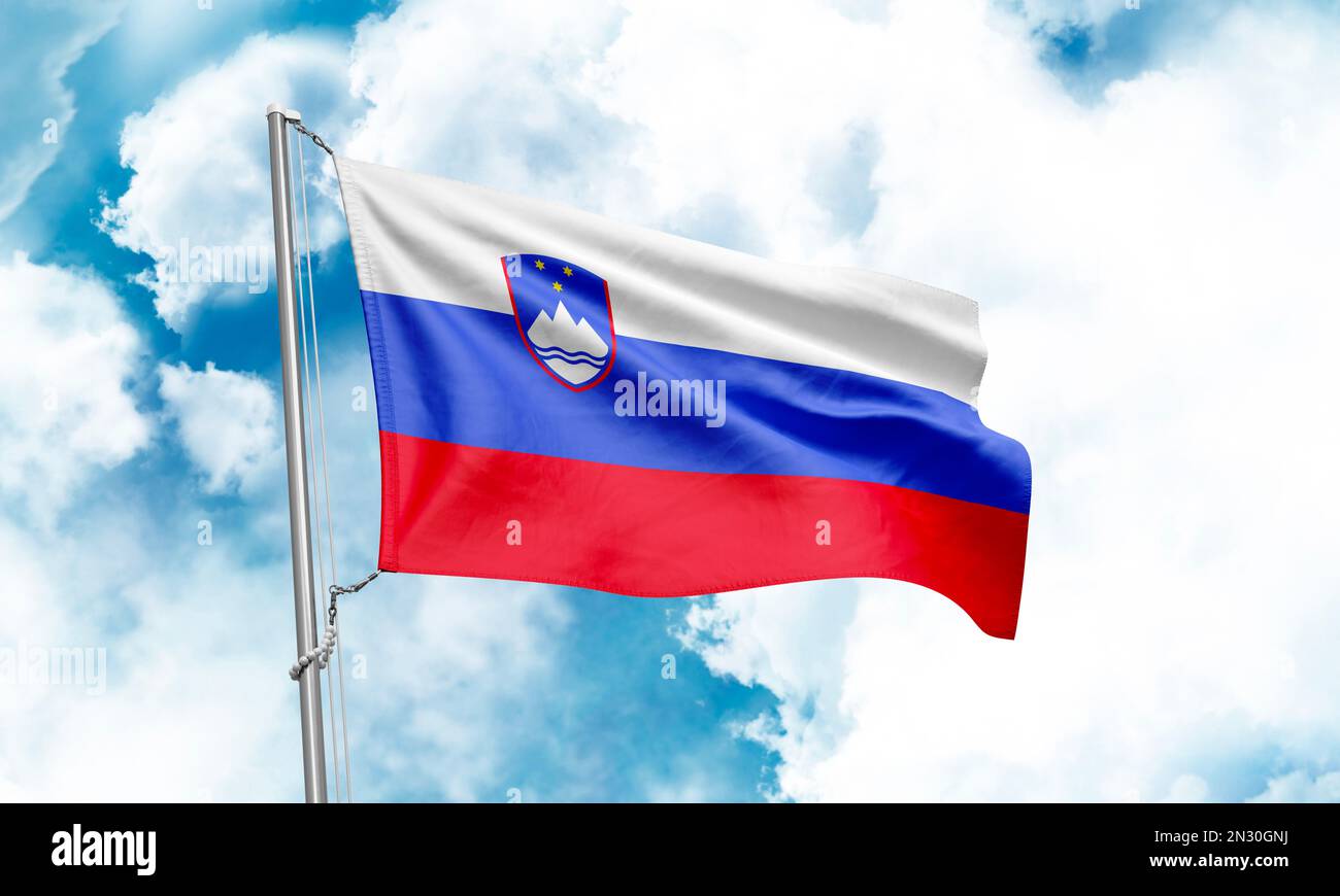 Slovenia flag waving on sky background. 3D Rendering Stock Photo - Alamy