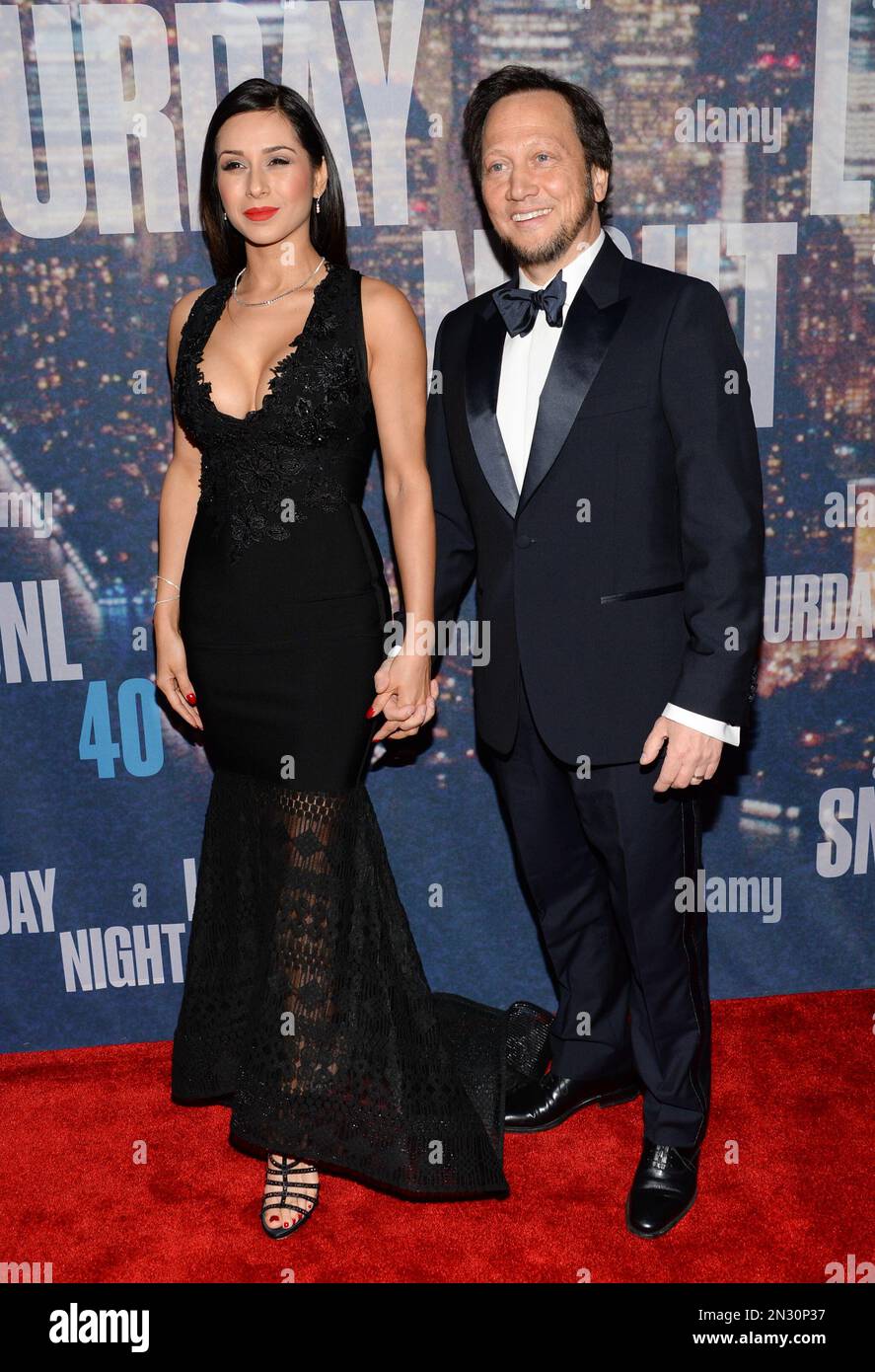 Rob Schneider and wife Patricia Azarcoya Arce attend the SNL 40th