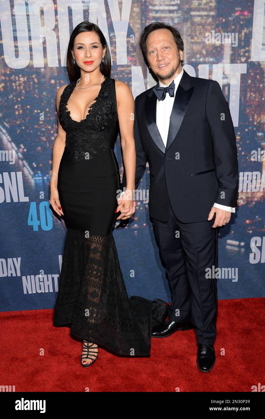 Rob Schneider and wife Patricia Azarcoya Arce attend the SNL 40th