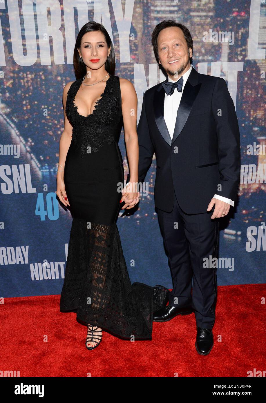 Rob Schneider and wife Patricia Azarcoya Arce attend the SNL 40th