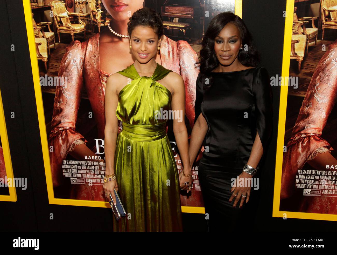 In this April 28, 2014 file photo, actress Gugu MbathaRaw, left, and