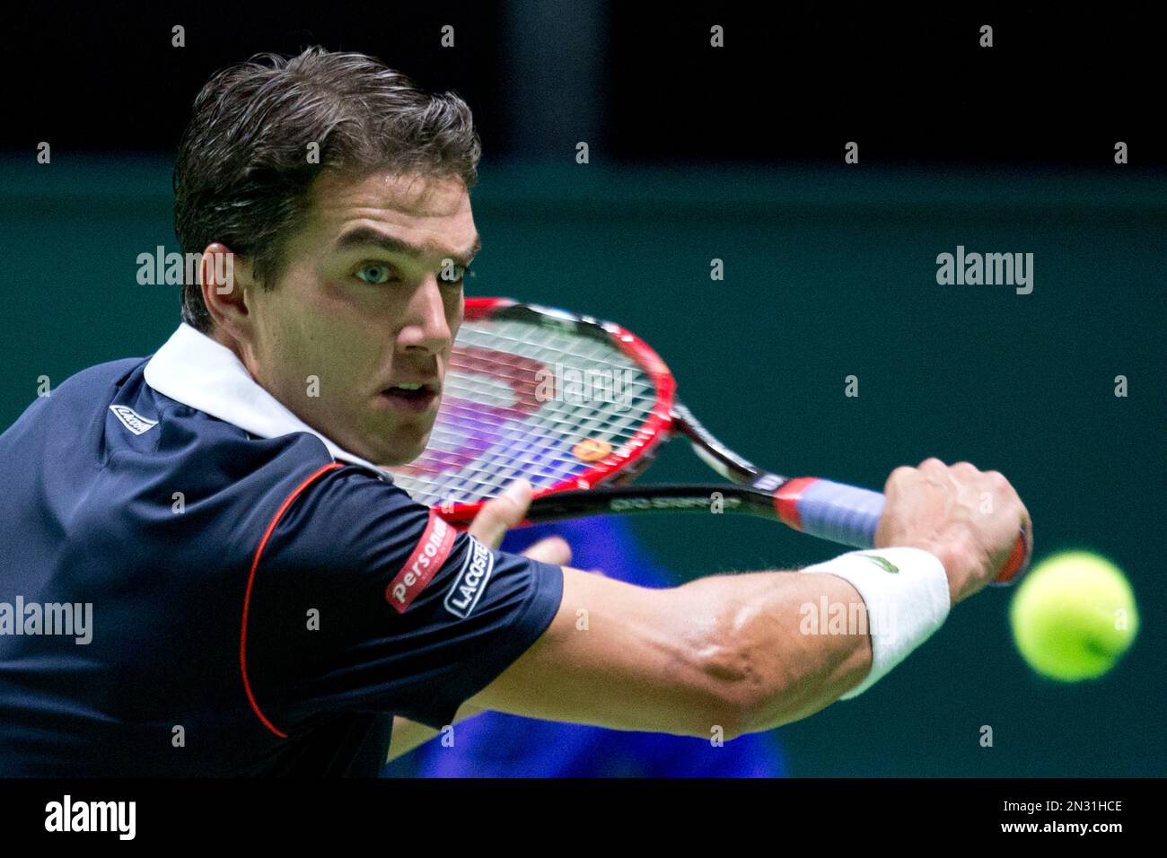 Jesse Huta Galung of the Netherlands returns the ball in his first round  match against Stan Wawrinka of Switzerland at the 42nd ABN AMRO world tennis  tournament at Ahoy Arena in Rotterdam,