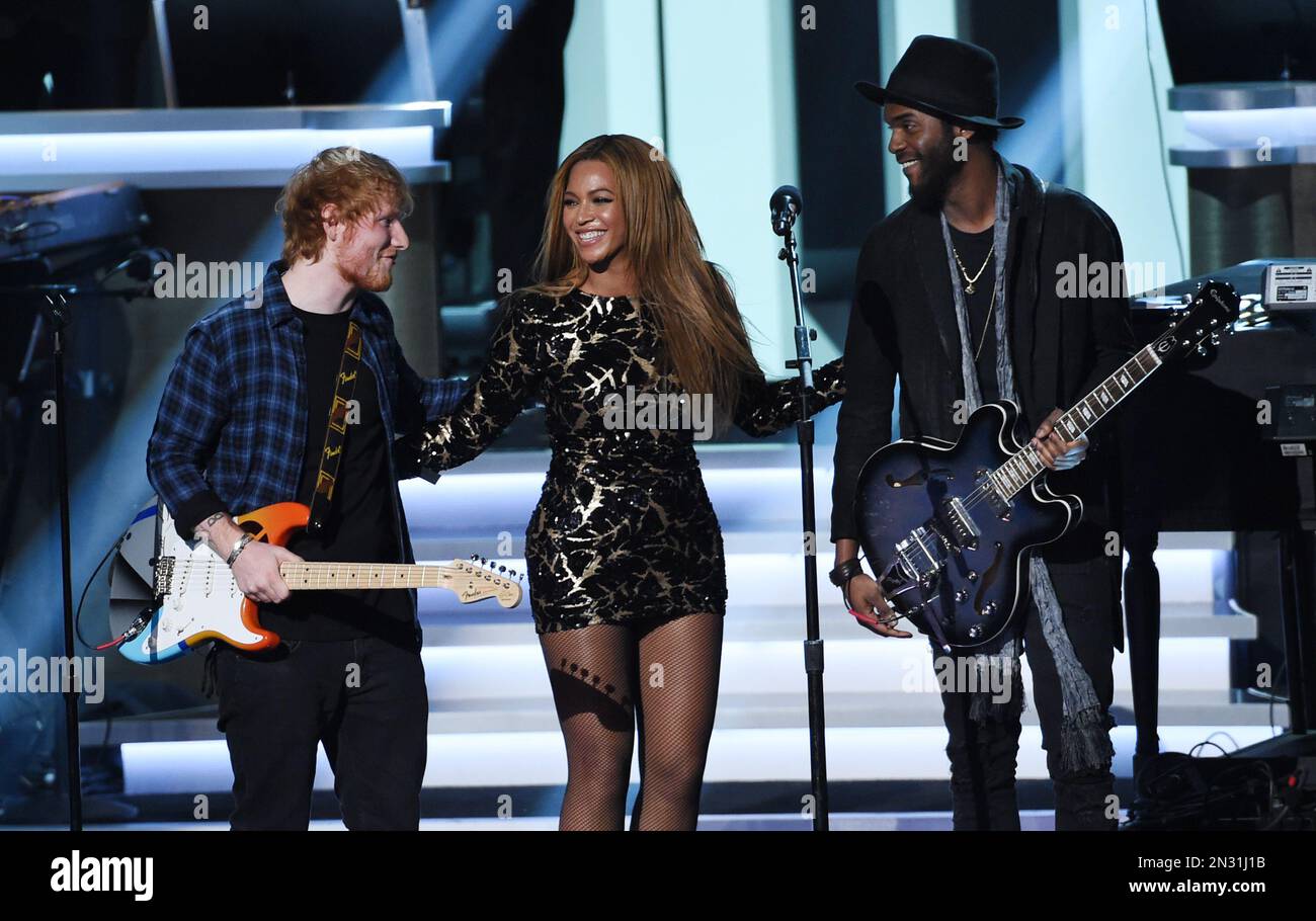 Beyonce, center, performs with Ed Sheeran, left, and Gary Clark Jr. at ...