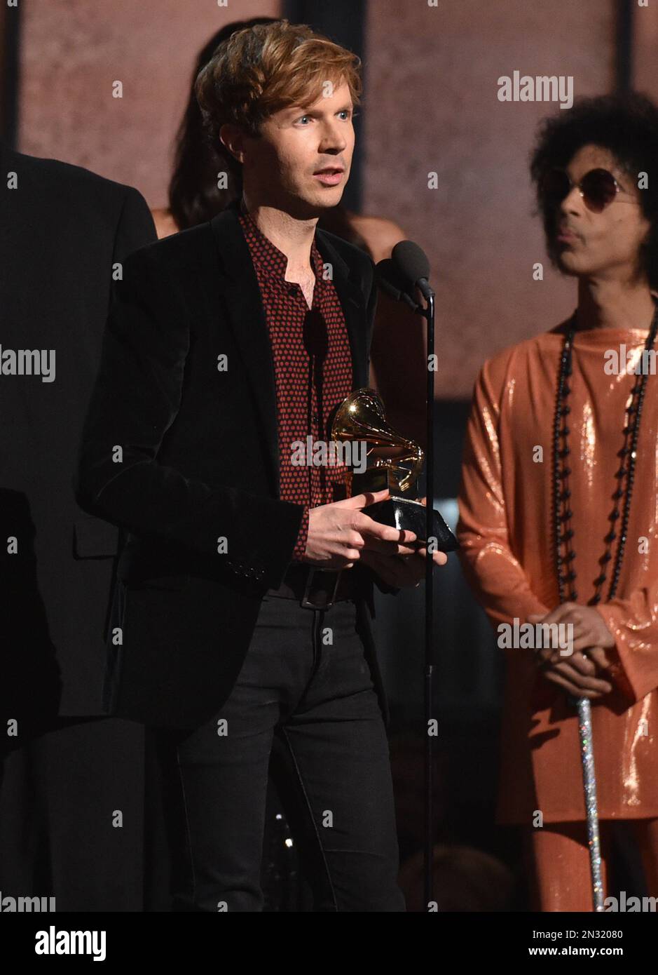 Beck accepts the award for album of the year for “Morning Phase” at the