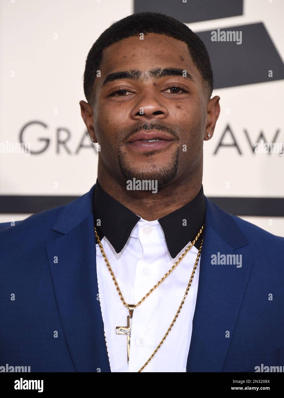 Malcolm Butler arrives at the 57th annual Grammy Awards at the Staples