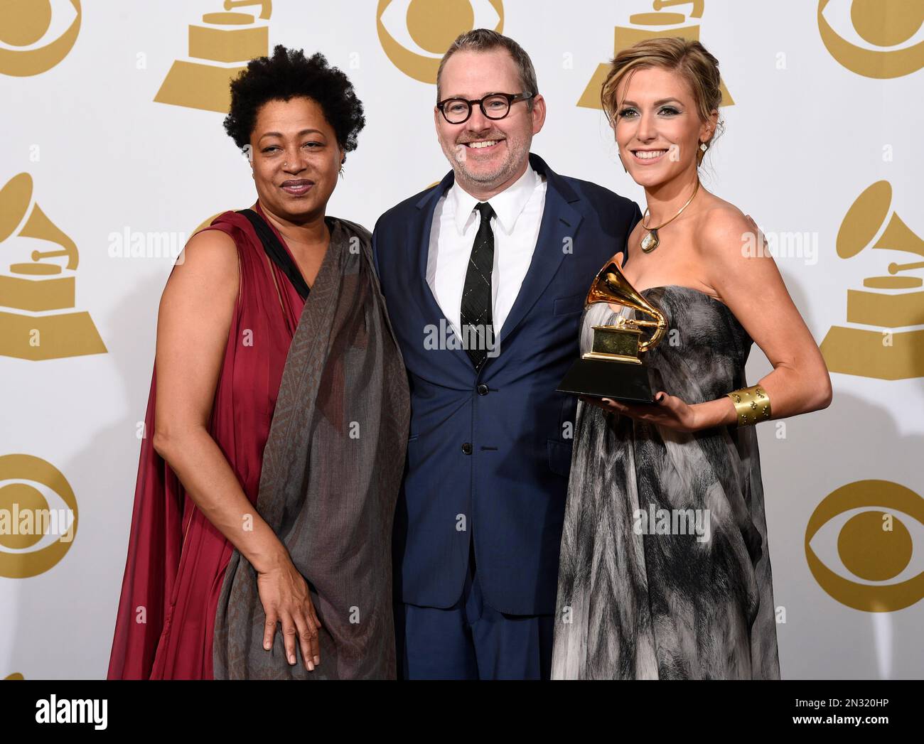 Lisa Fischer, from left, Neville and Caitrin Rogers pose in the
