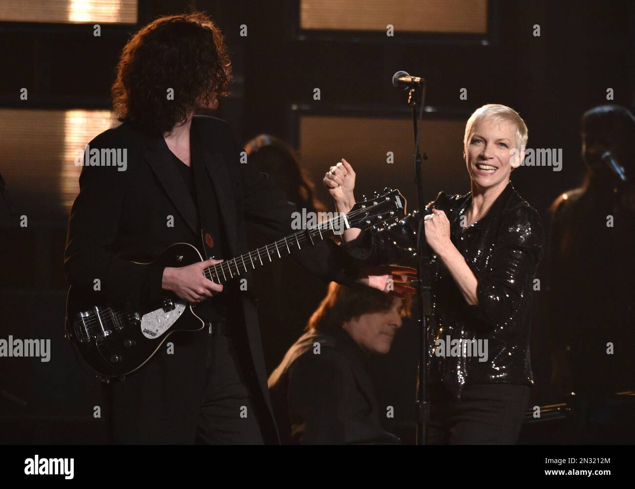 Hozier, left, and Annie Lennox perform at the 57th annual Grammy Awards