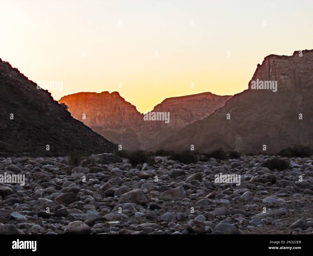 Namibia Cliffs Sunrise as seen between the cliffs of the Fish River Canyon in Southern ...