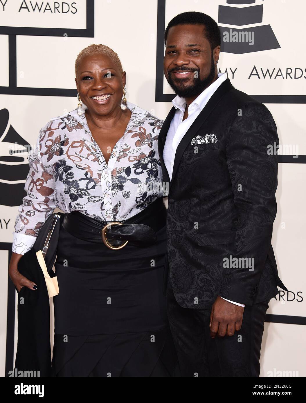 Pamela Warner, left, and Malcolm-Jamal Warner arrive at the 57th annual