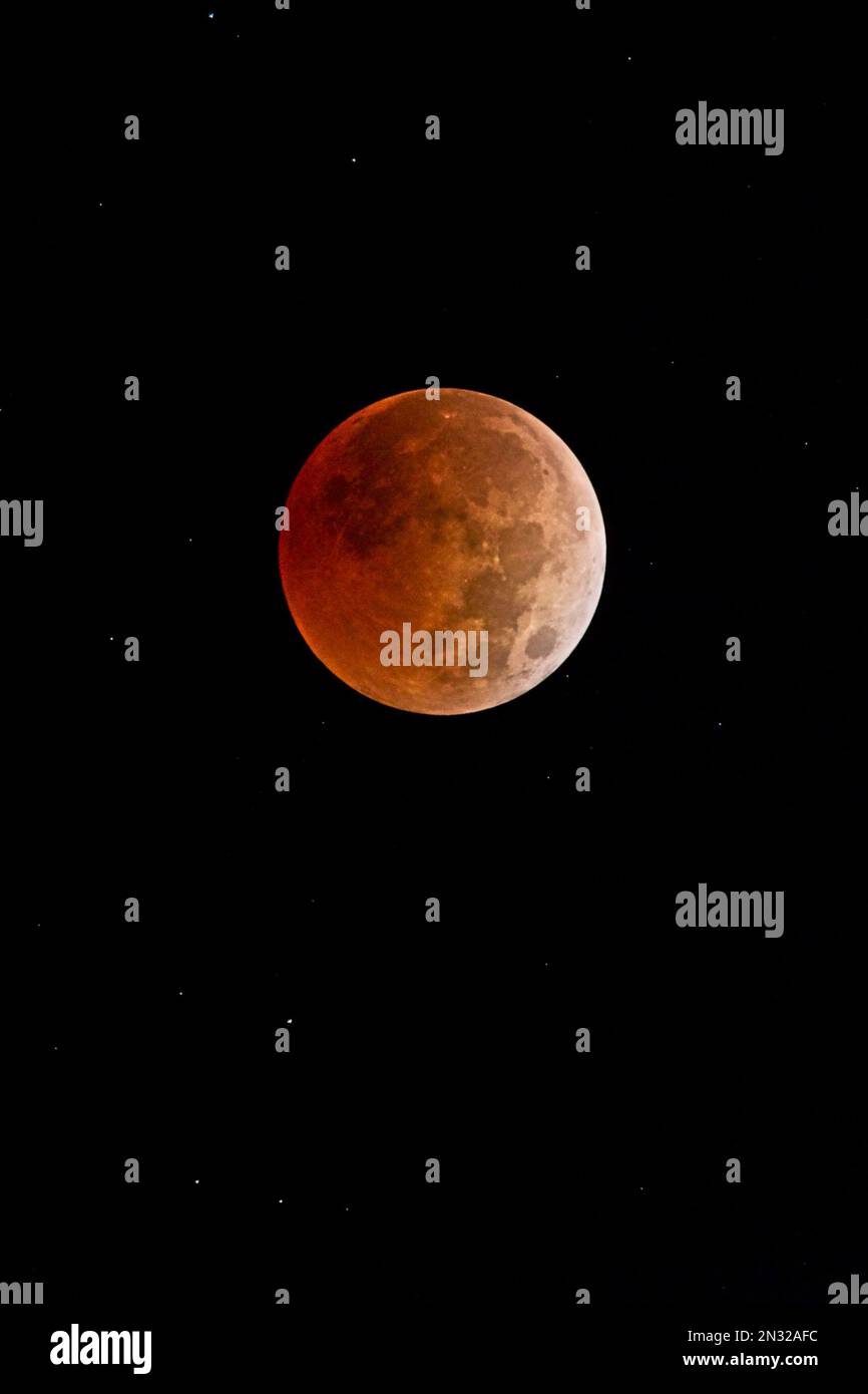 A full moon in night sky during Lunar Eclipse Stock Photo - Alamy