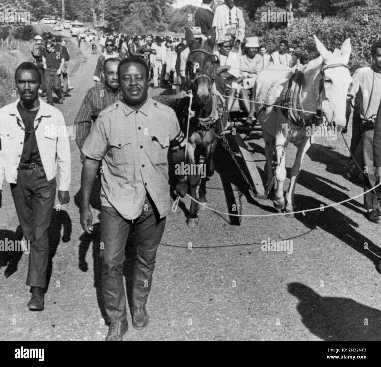 The Rev. Ralph Abernathy, foreground, leads a muledrawn wagon at the