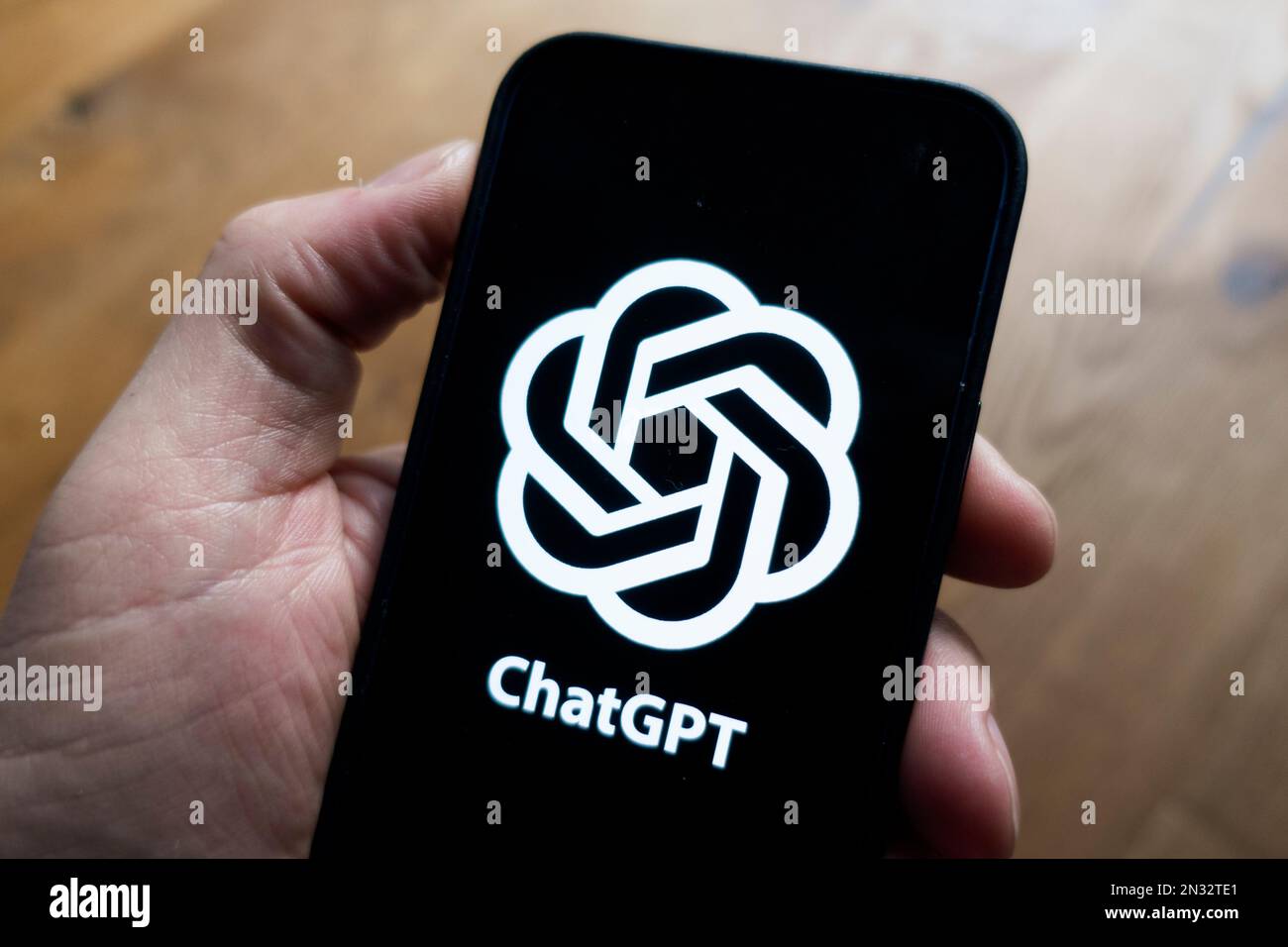 OpenAI ChatGPT logo shown on mobile phone Stock Photo