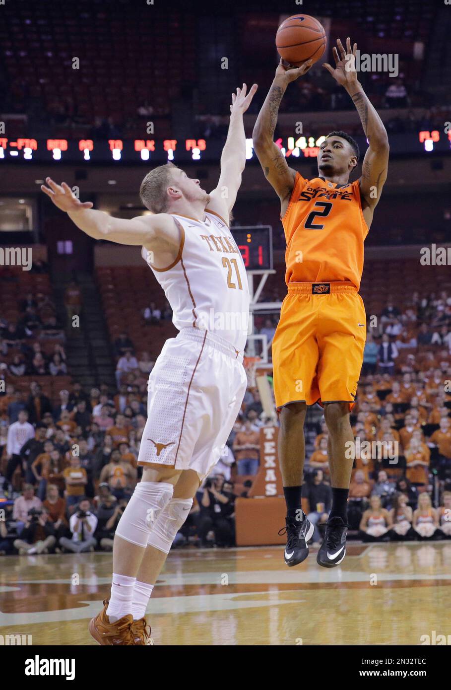 Oklahoma State’s Le'Bryan Nash (2) shoots over Texas’ Connor Lammert