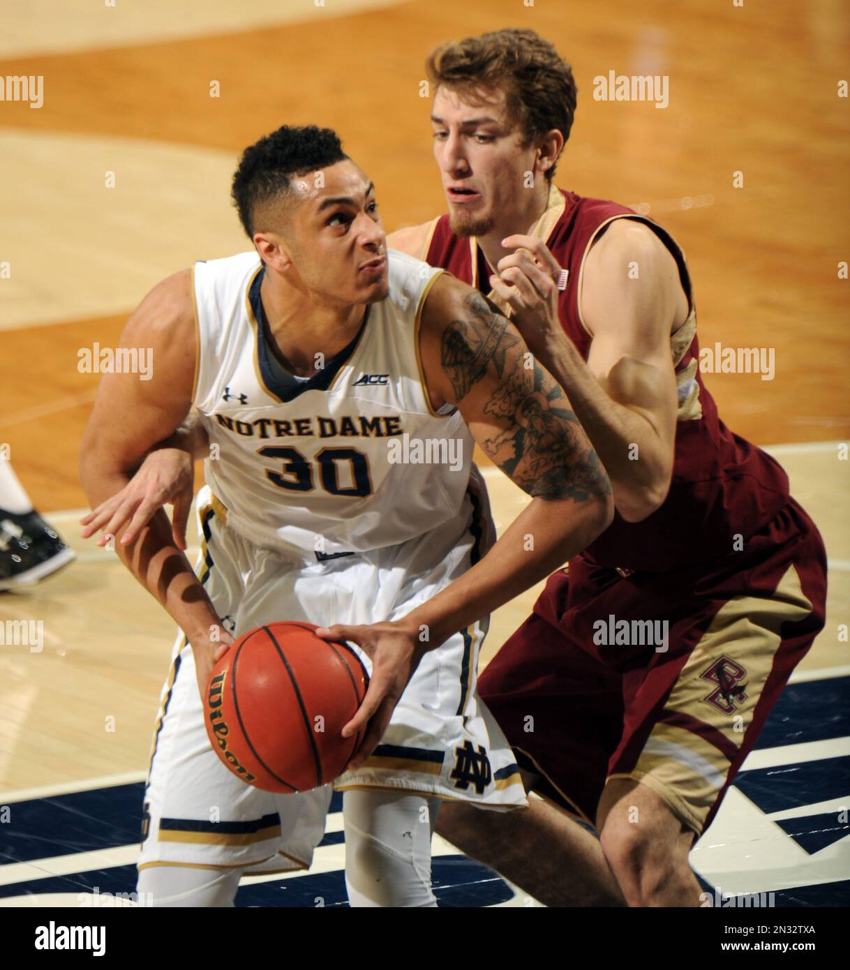 Notre Dame forward Zach Auguste (30) drives the lane as Boston College