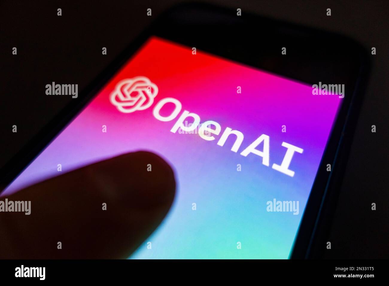 OpenAI ChatGPT logo shown on mobile phone Stock Photo