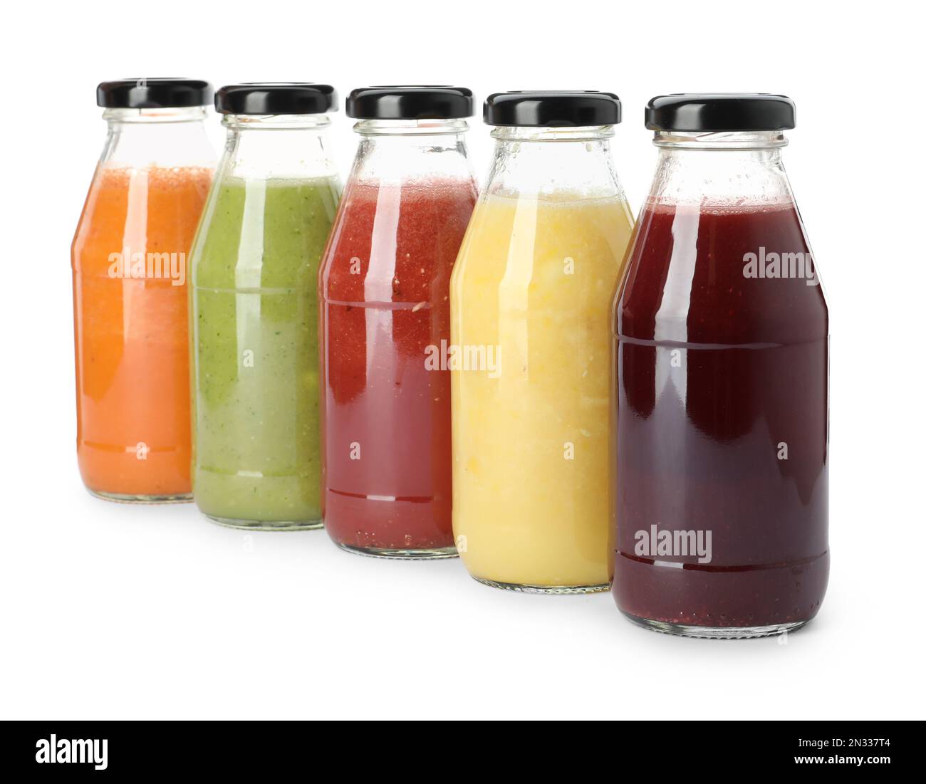 Bottles of fresh juices on white background Stock Photo Alamy