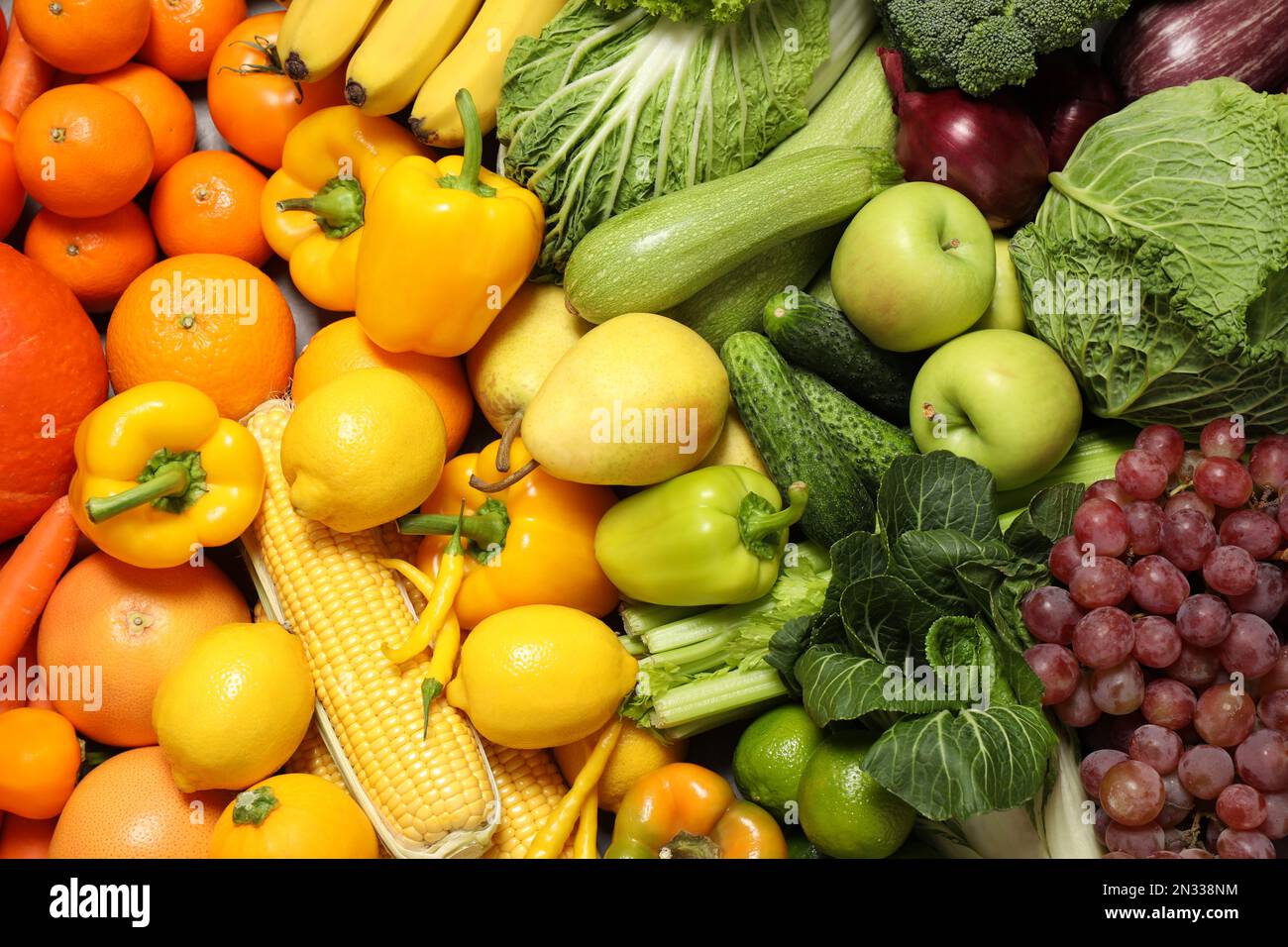Assortment of organic fresh fruits and vegetables as background ...