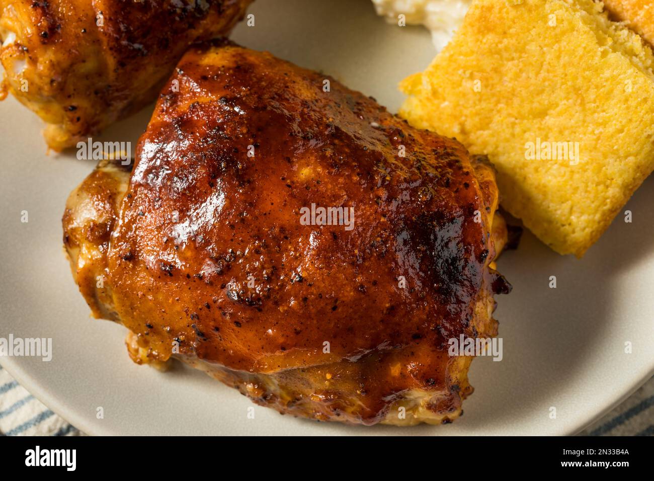 Homemade Healthy BBQ Chicken Thighs with Barbecue Sauce Stock Photo Alamy