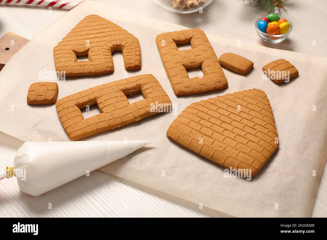Parts of gingerbread house on white table Stock Photo Alamy