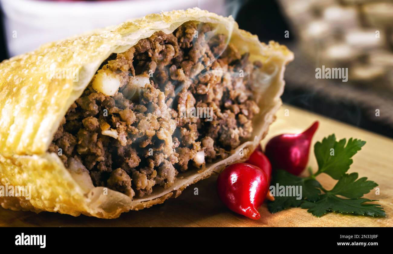Fried dough stuffed with ground meat, called pastel, typical Brazilian