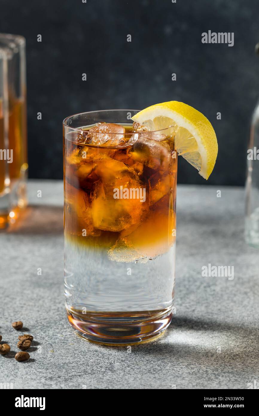 Boozy Cold Bourbon Quick Start Cocktail with Tonic and Coffee Stock Photo