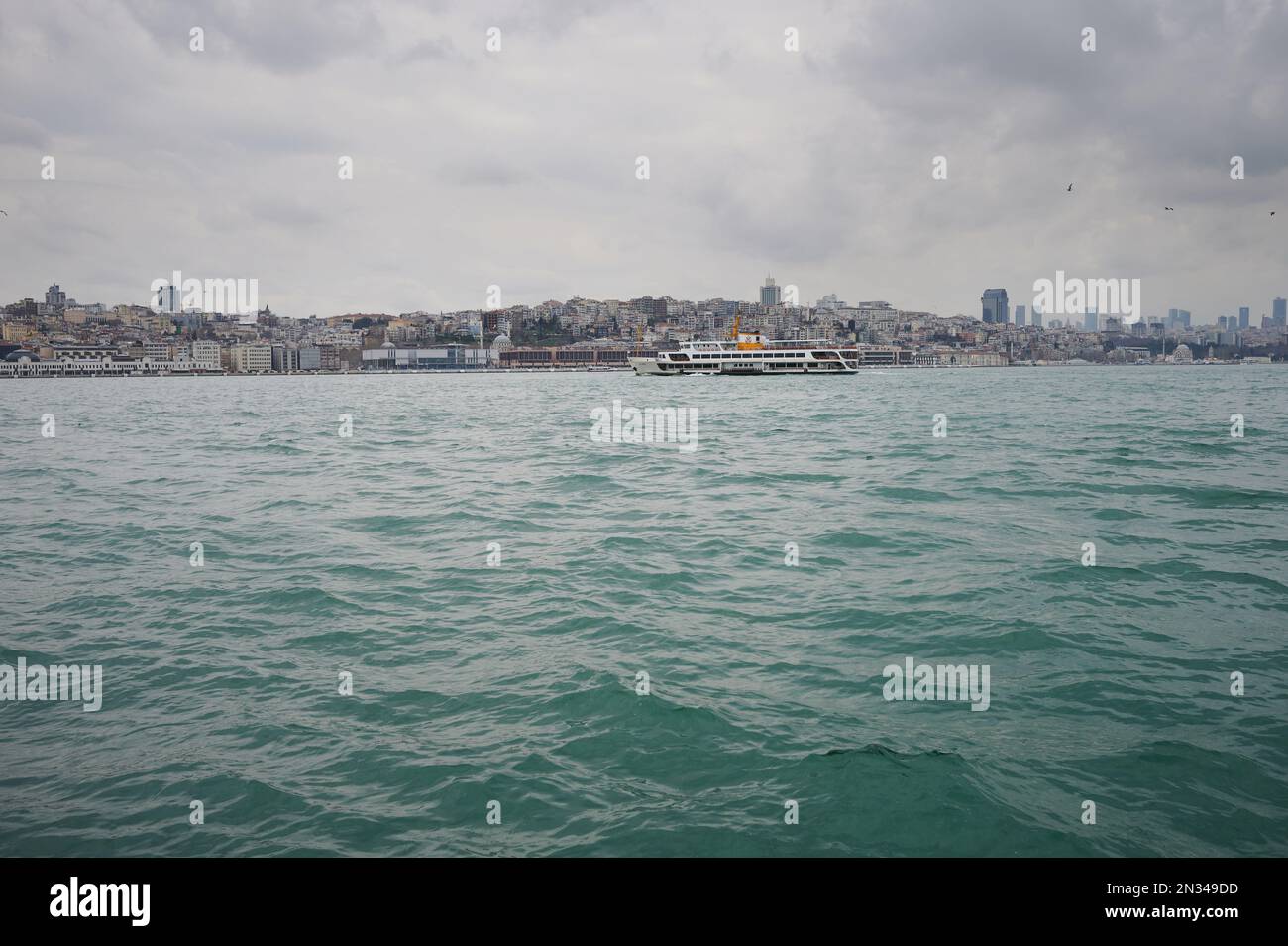 Boat tours in Bosphorus Istanbul on cityscape background Stock Photo