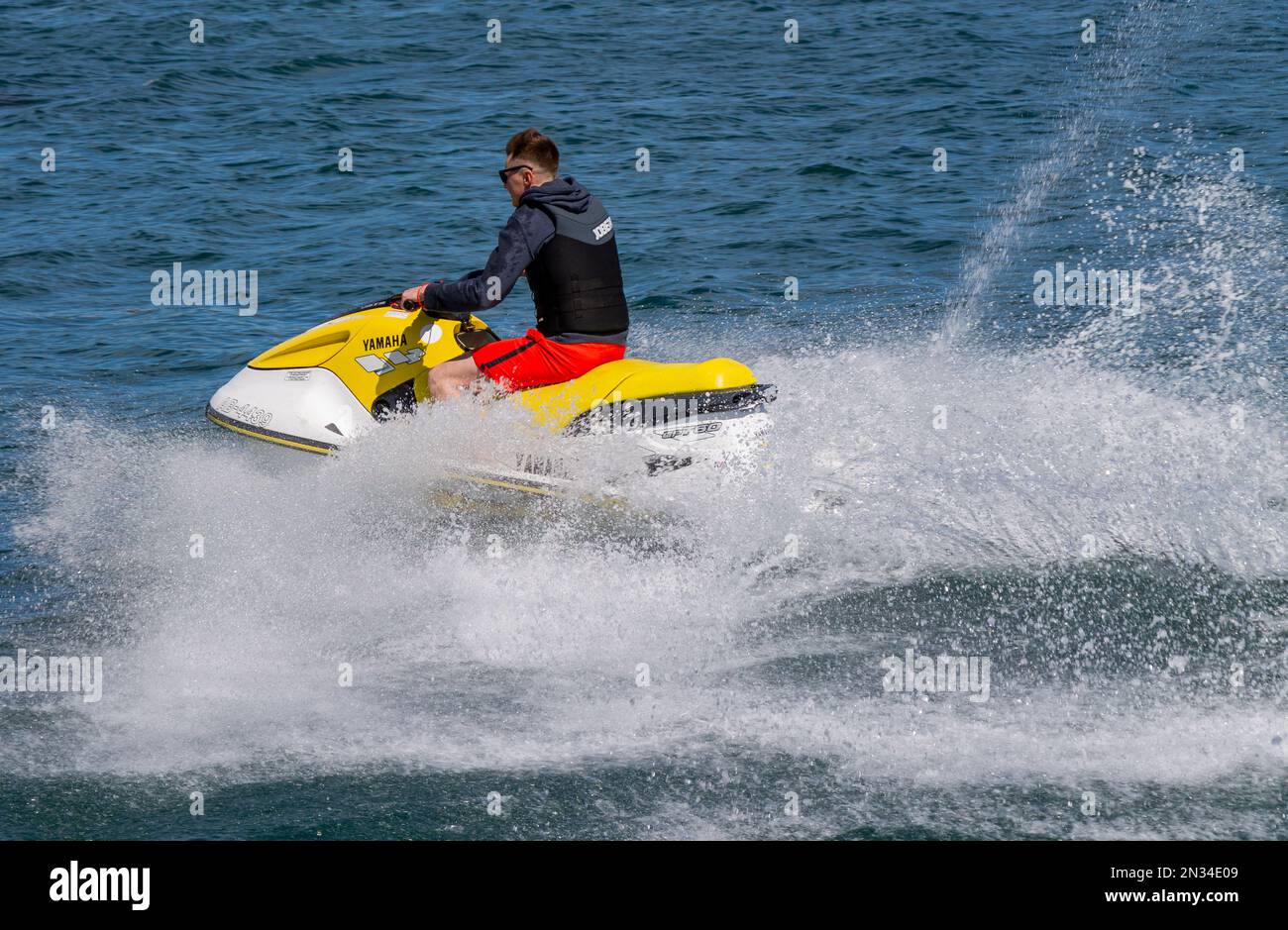 Man or male riding a jet ski Stock Photo
