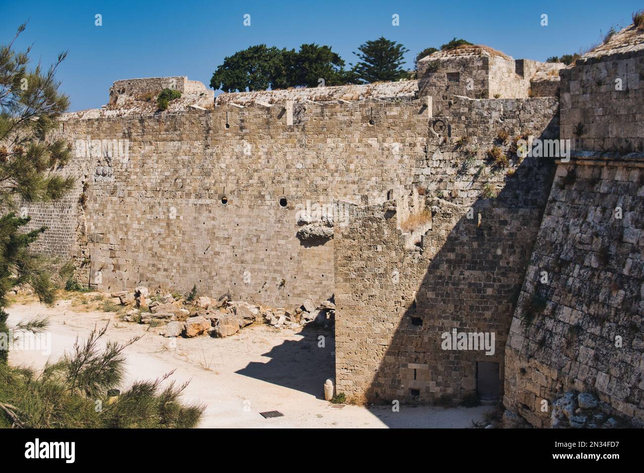Walls and fortifications of the medieval citadel of Rhodes in Greece built by Hospitalliers Stock Photo