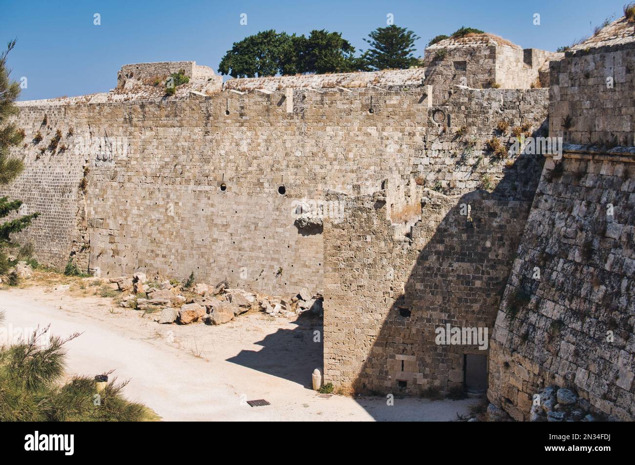 Walls and fortifications of the medieval citadel of Rhodes in Greece built by Hospitalliers Stock Photo