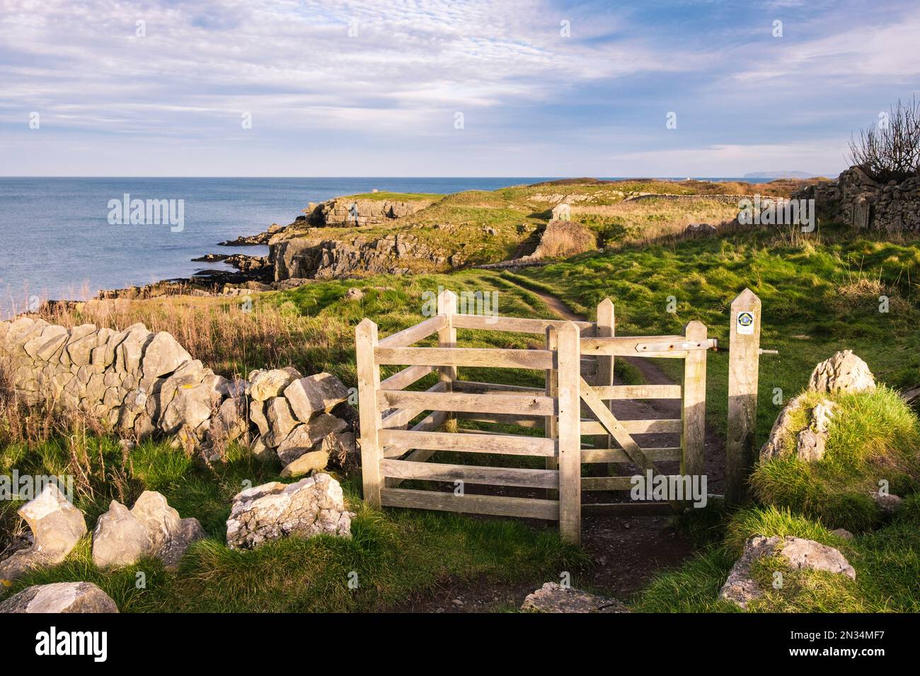 Gate on the Welsh coastal footpath around Moelfre, Isle of Anglesey, Wales, UK, Britain Stock Photo