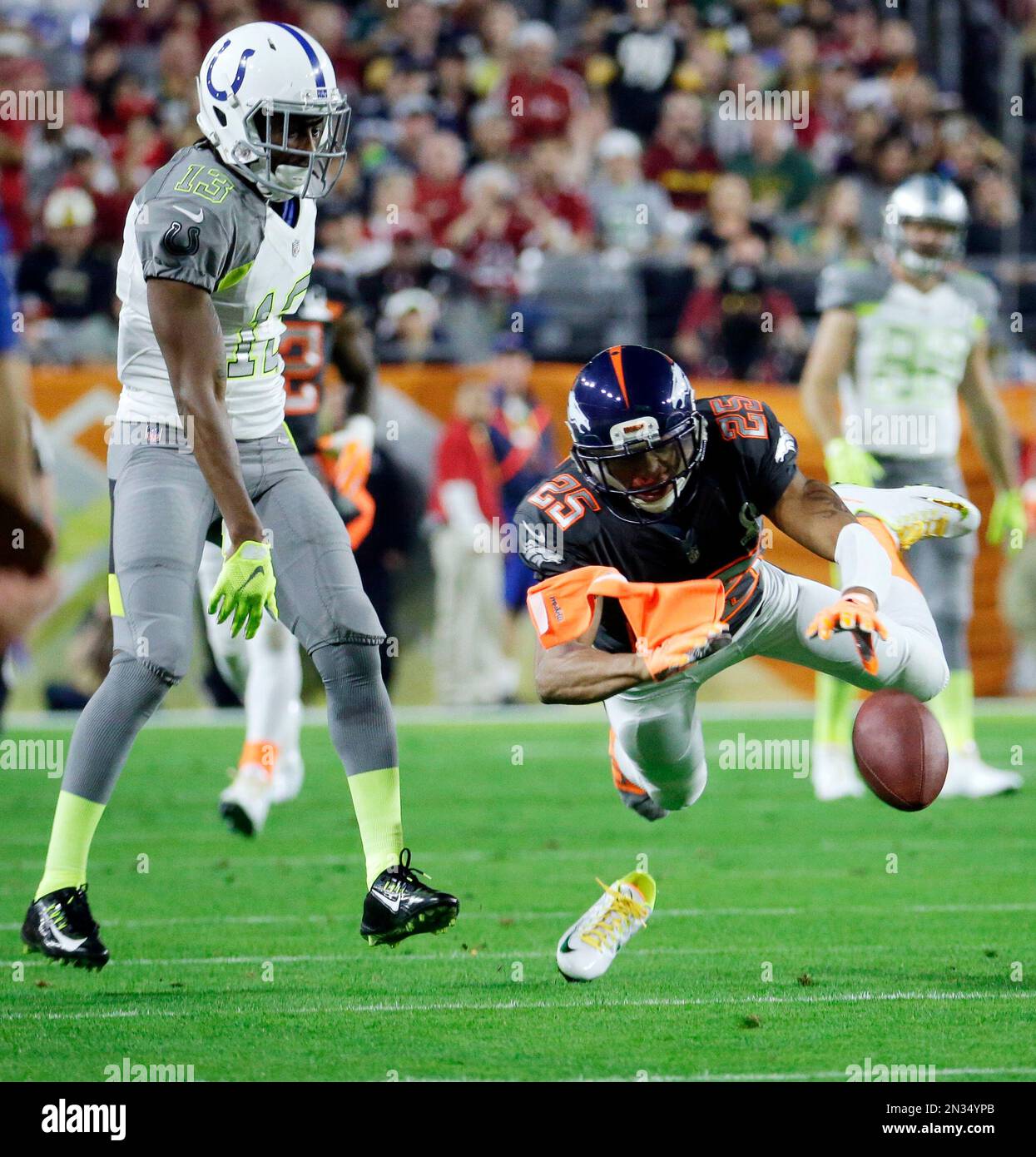 Denver Broncos' Chris Harris breaks up a pass intended for Indianapolis ...