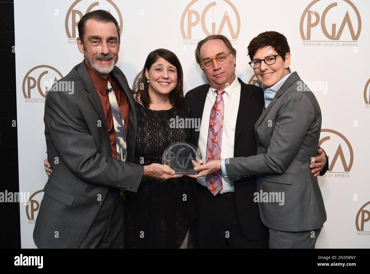EXCLUSIVE Mark A. Burley, and from left, Lisa I. Vinnecour, Michael