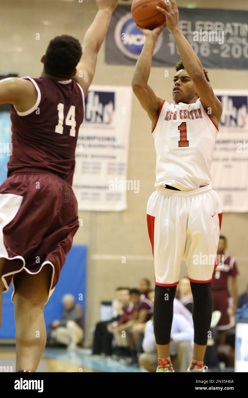 Life Center's Malik Ellison 1 in action against MacDuffie during their