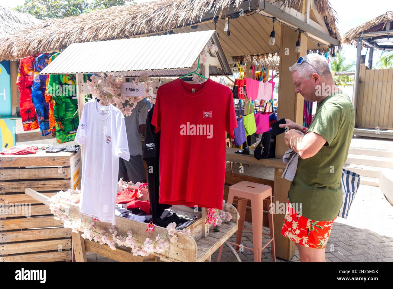 T-shirt stall at Harbour Lights Beach Club, Carlisle Bay, Bridgetown, St Michael Parish, Barbados, Lesser Antilles, Caribbean Stock Photo