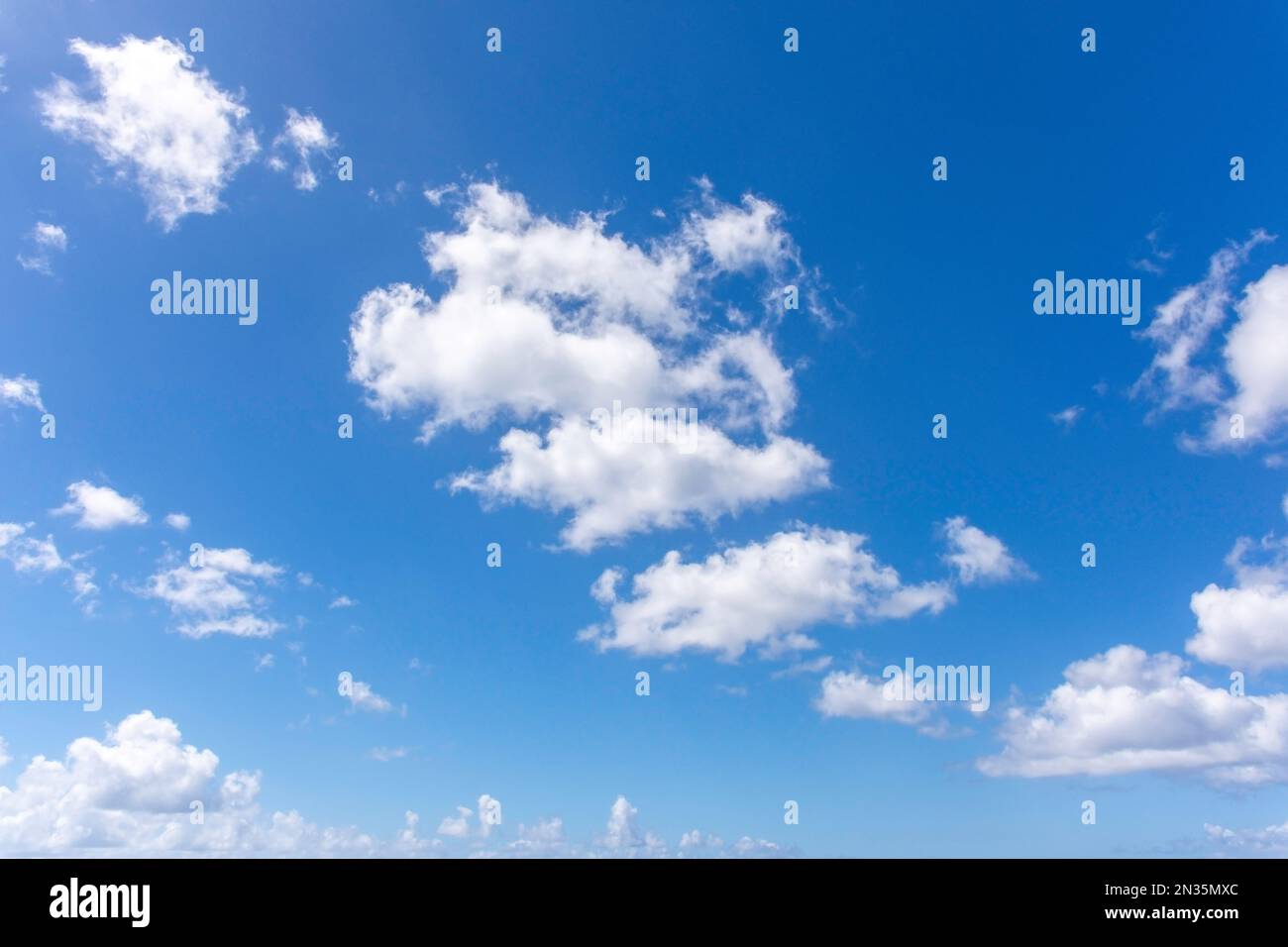 White cumulus clouds against blue sky, Carlisle Bay, Bridgetown, St Michael Parish, Barbados, Lesser Antilles, Caribbean Stock Photo