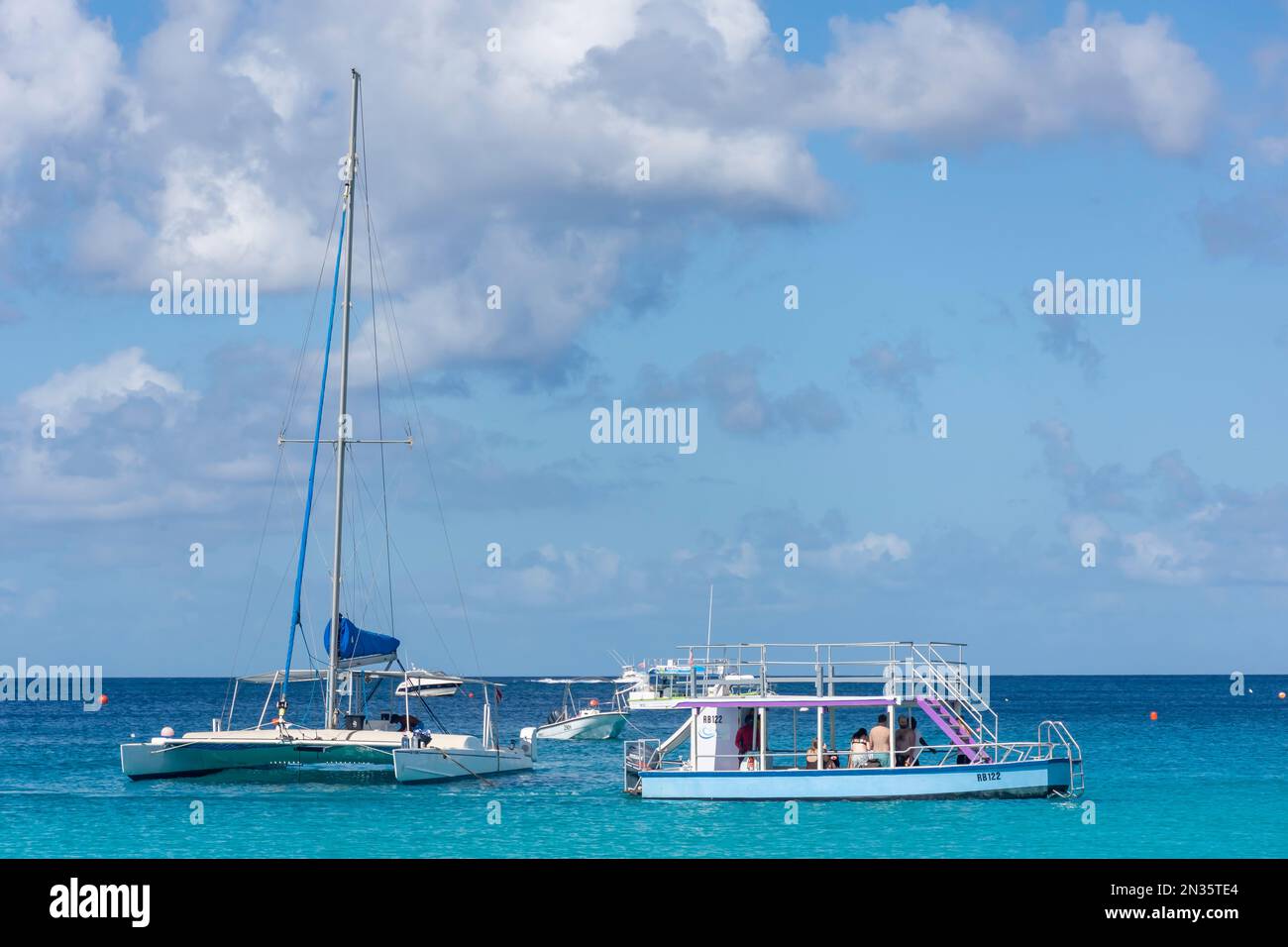 Glass Bottom Boat and catamaran at Bayshore Beach, Carlisle Bay