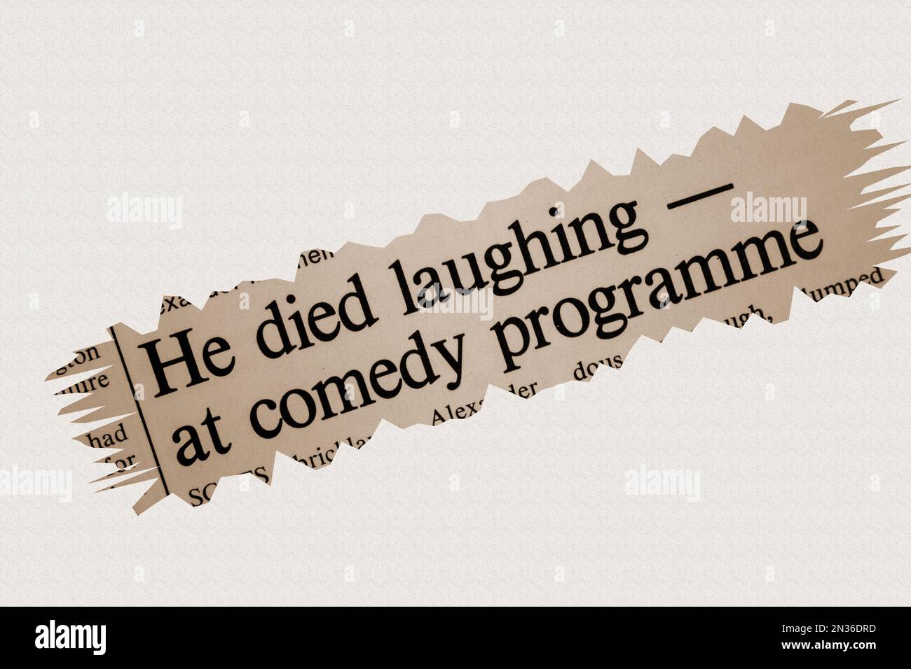 He died laughing - at comedy programme - news story from 1975 newspaper headline article title in sepia Stock Photo