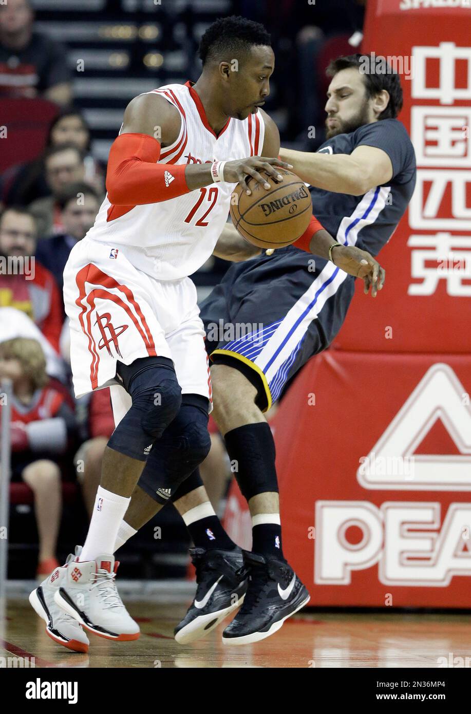 Houston Rockets' Dwight Howard (12) earns an offensive fouls as he ...