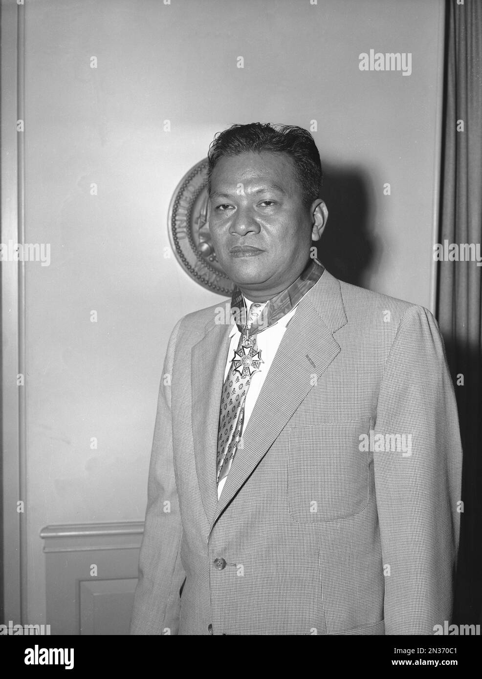 Ramon Magsaysay, wearing a U.S. Legion of Merit medal awarded to him at the Pentagon last year