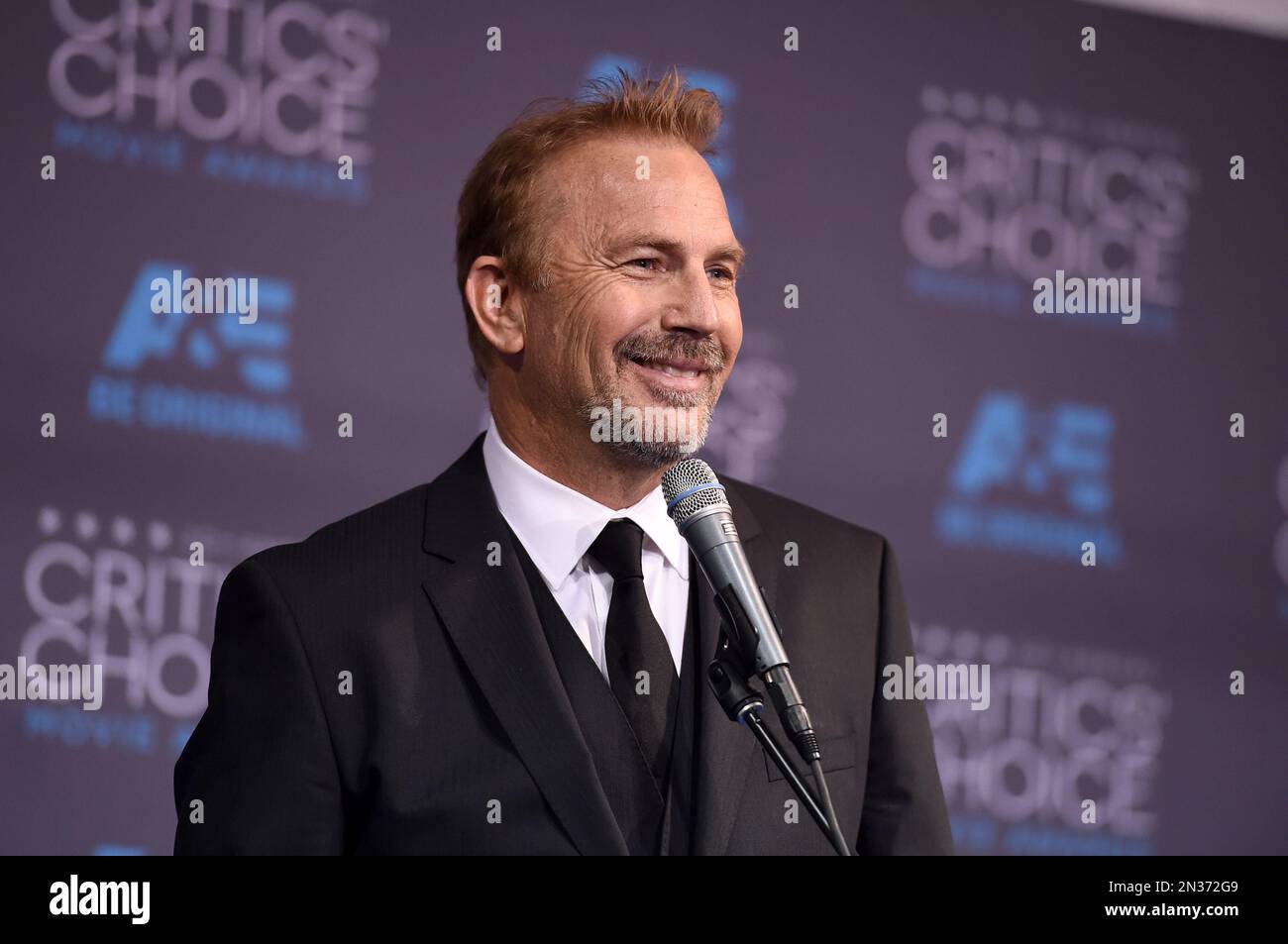 Kevin Costner, winner of the lifetime achievement award, poses in the