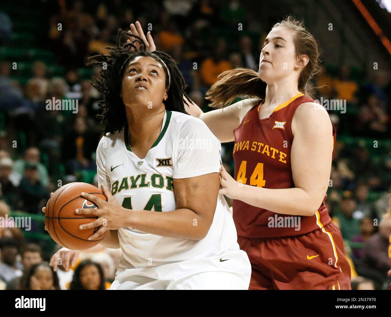 Baylor's Kristina Higgins, left, positions for a shot against Iowa State's  Bryanna Fernstrom, right, during an NCAA college basketball game, Tuesday,  Jan. 13, 2015, in Waco, Texas. (AP Photo/Tony Gutierrez Stock Photo -