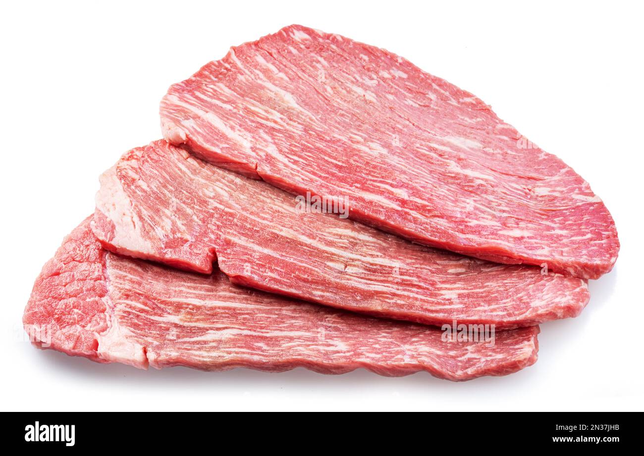 Raw beef steaks isolated on white background. Closeup Stock Photo - Alamy