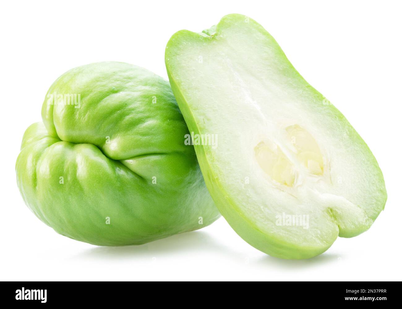 Chayote fruit and half of chayote fruit isolated on white background. Stock Photo