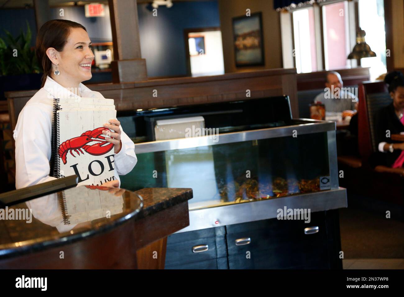 A Red Lobster hostess is ready to greet guests. (Brian Blanco/AP Images