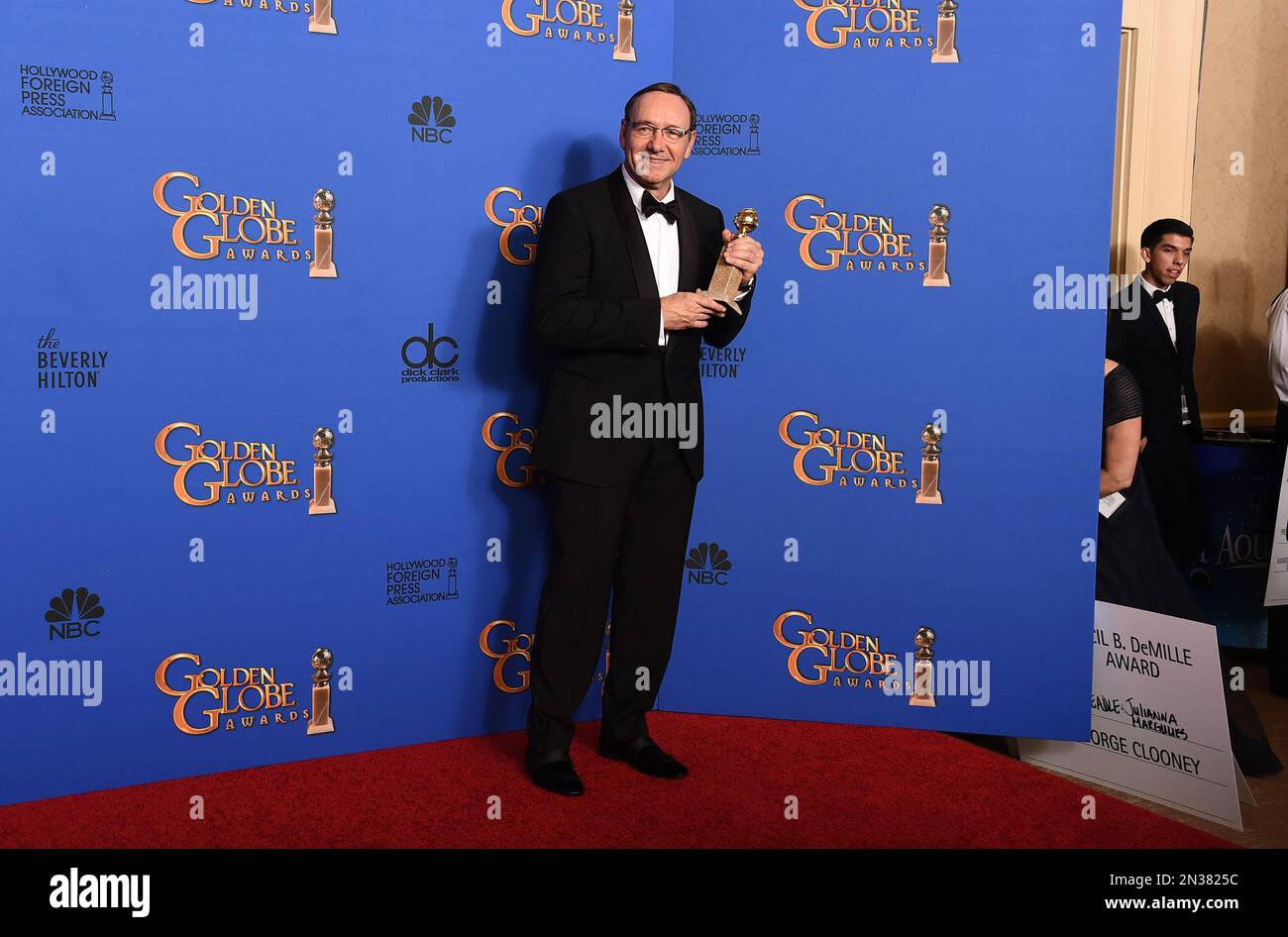 Kevin Spacey poses in the press room with the award for best actor in a