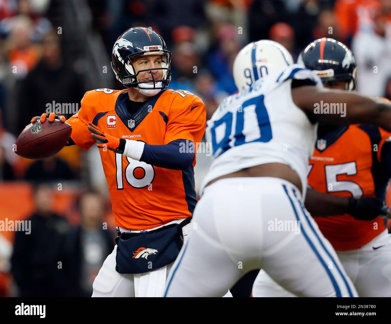 Denver Broncos quarterback Peyton Manning (18) throws against the ...