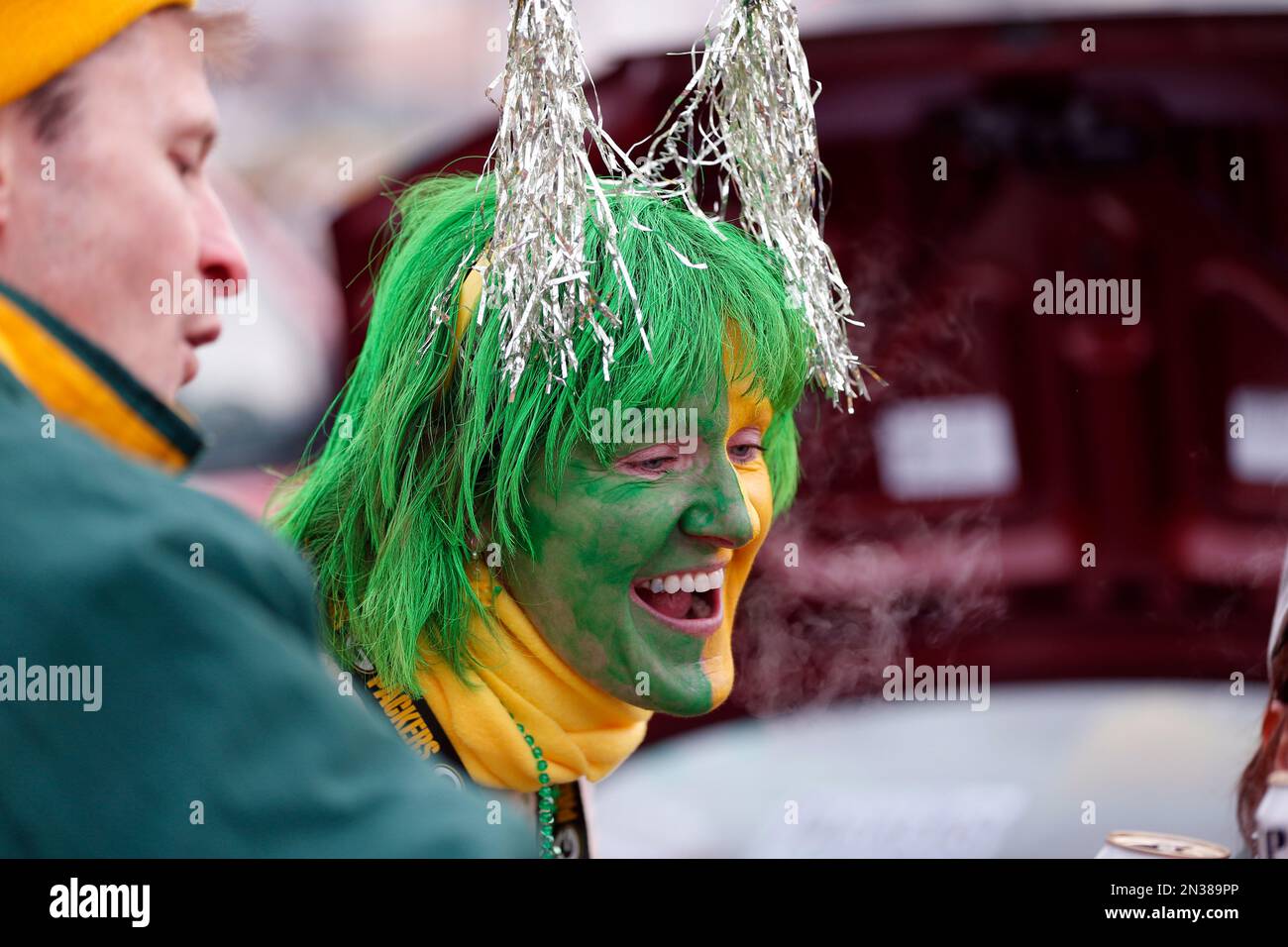 Fans tailgate before an NFL divisional playoff football game between