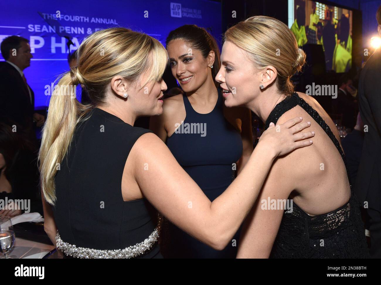 From left, Reese Witherspoon, Charlize Theron and Salma Hayek are seen