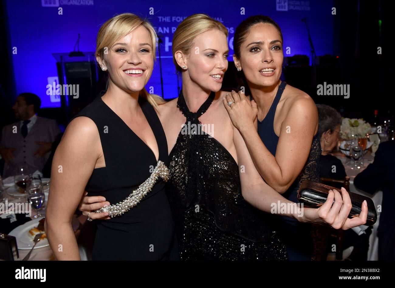 From left, Reese Witherspoon, Charlize Theron and Salma Hayek are seen