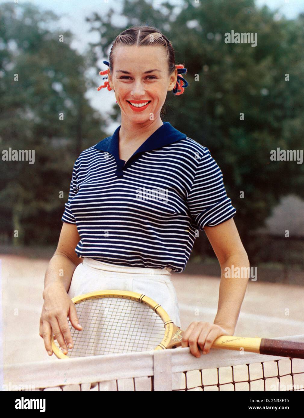 Gertrude 'Gussie' Moran (1923-2013), American Tennis Player, half-length Portrait with Tennis Racquet, Harry Warnecke, 1949 Stock Photo